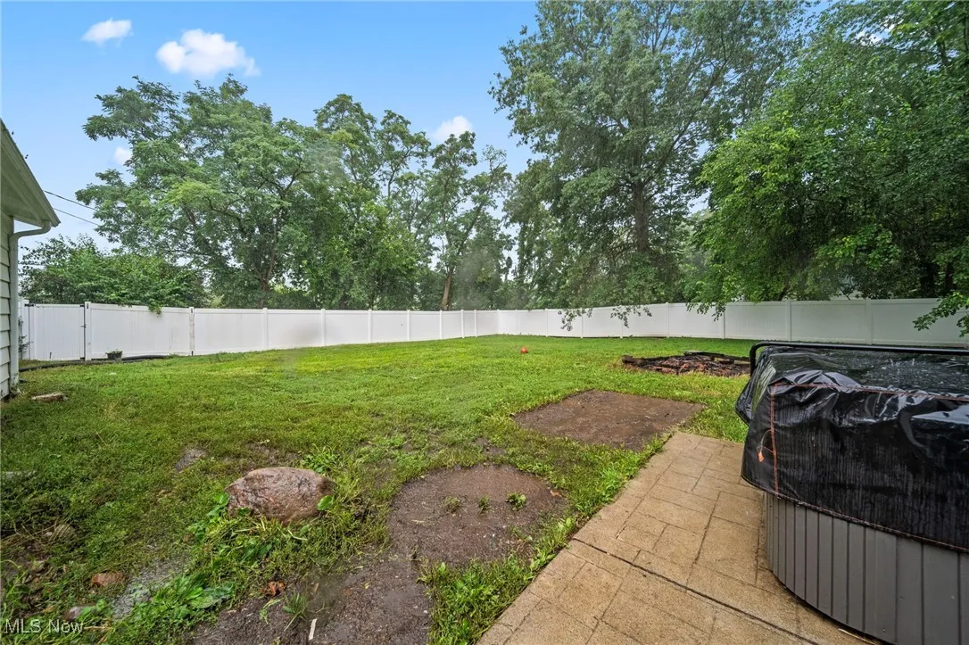 View of fenced backyard