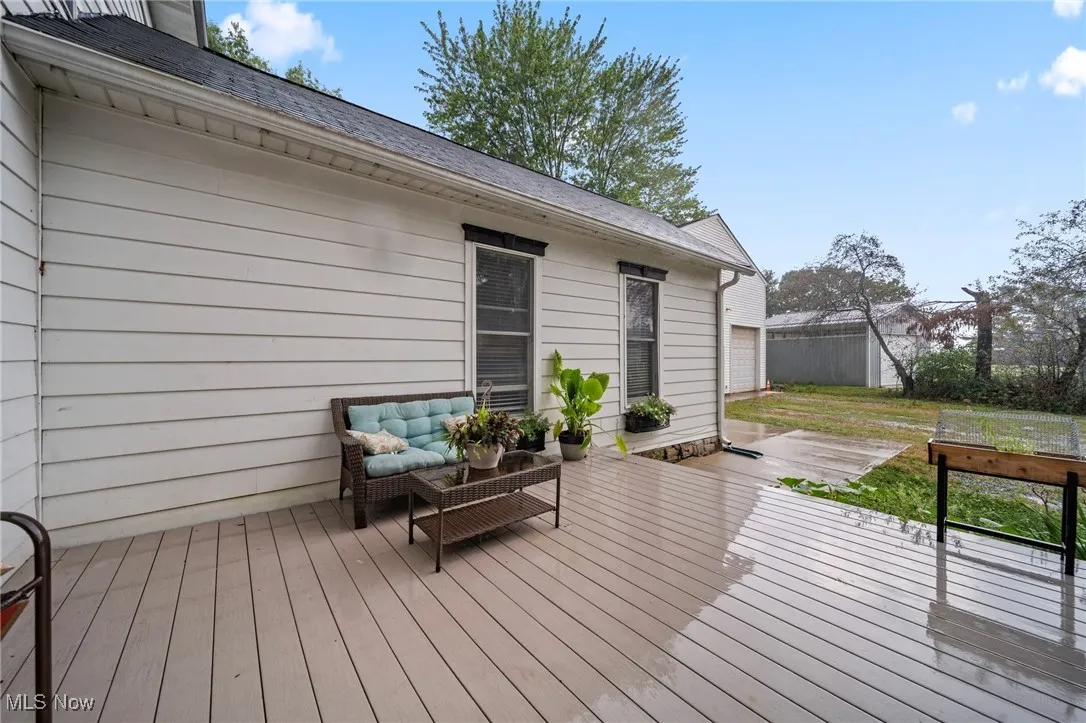 Wooden deck with an outdoor hangout area