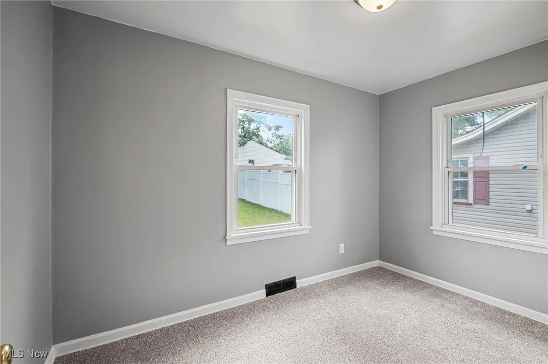 Bedroom 2 featuring carpet flooring