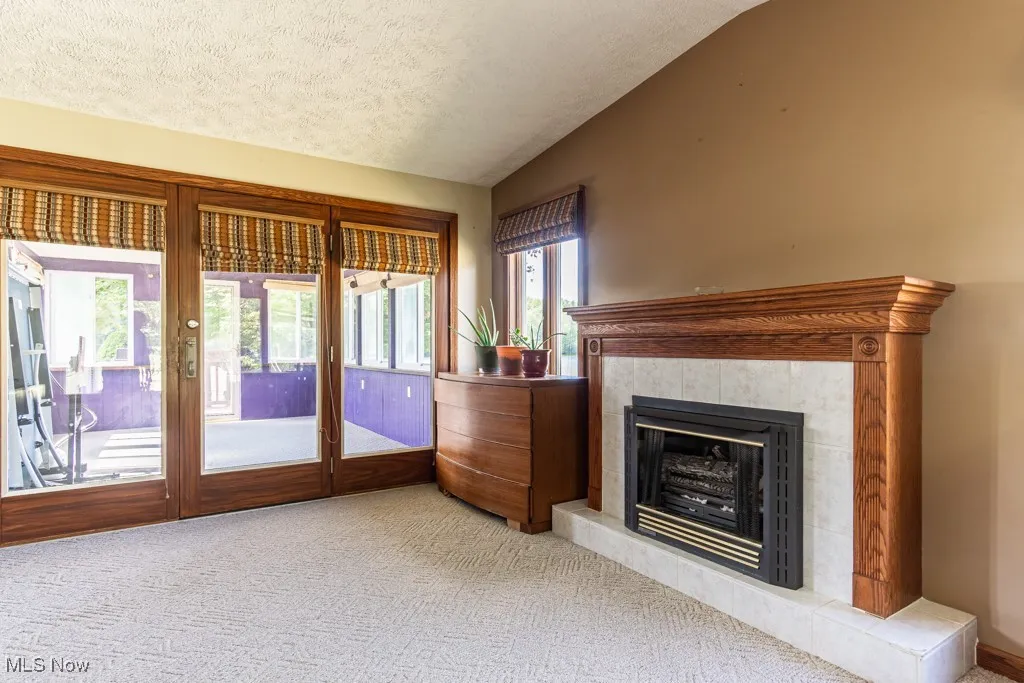 Family room with wood burning fireplace