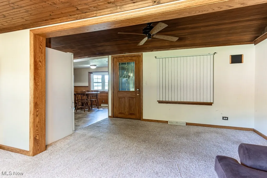 Living room looking towards front enclosed porch