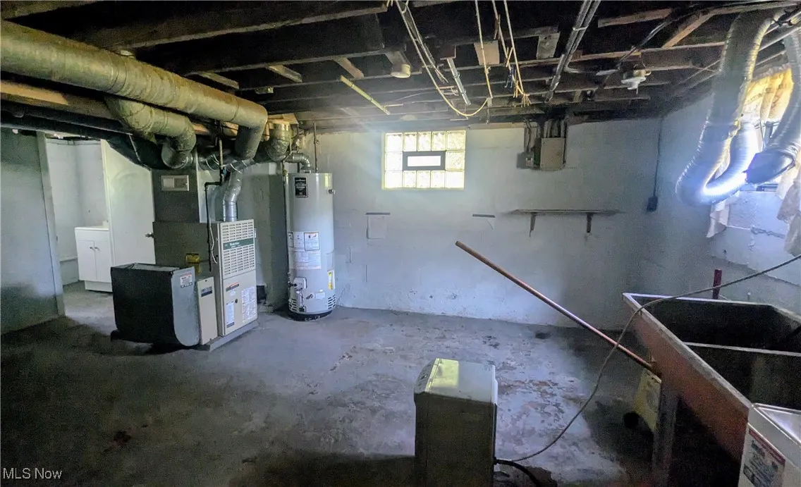 view of laundry area and in basement
