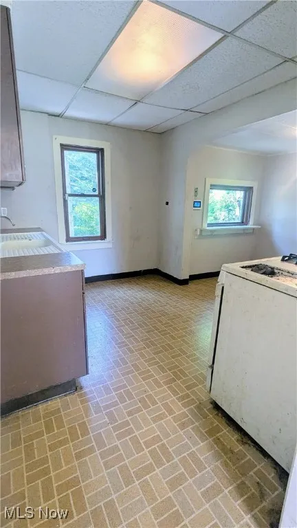 View of spacious kitchen off dining room