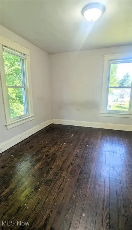 view of second bedroom with hardwood floors