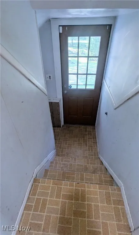 View of stairs leading to side door