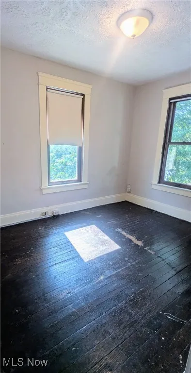 View of 3rd bedroom with hardwood floors