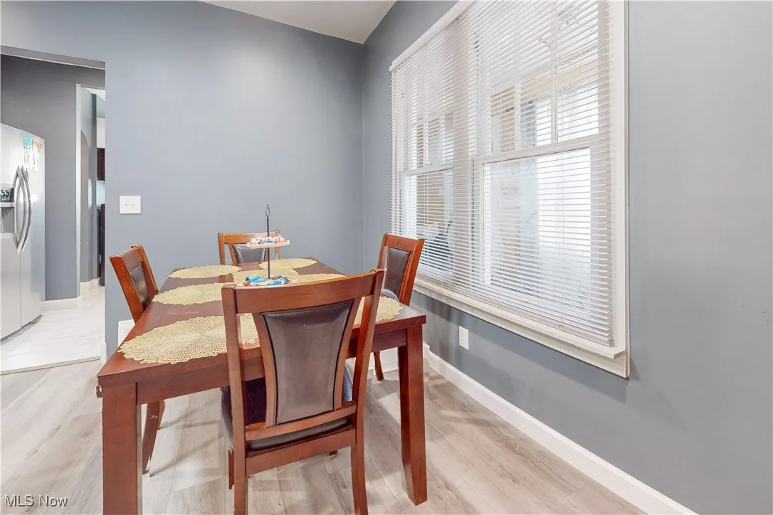 Dining room with light wood-style floors
