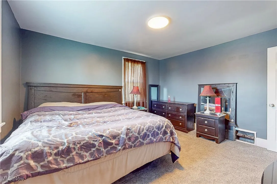 Bedroom featuring carpet flooring