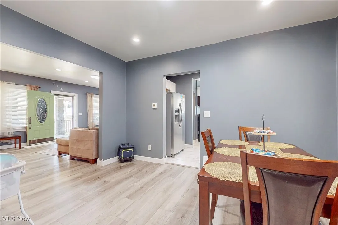Dining area featuring recessed lighting and light wood-style floors