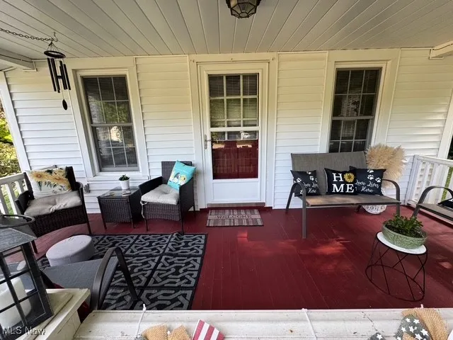 View of wooden porch and entrance