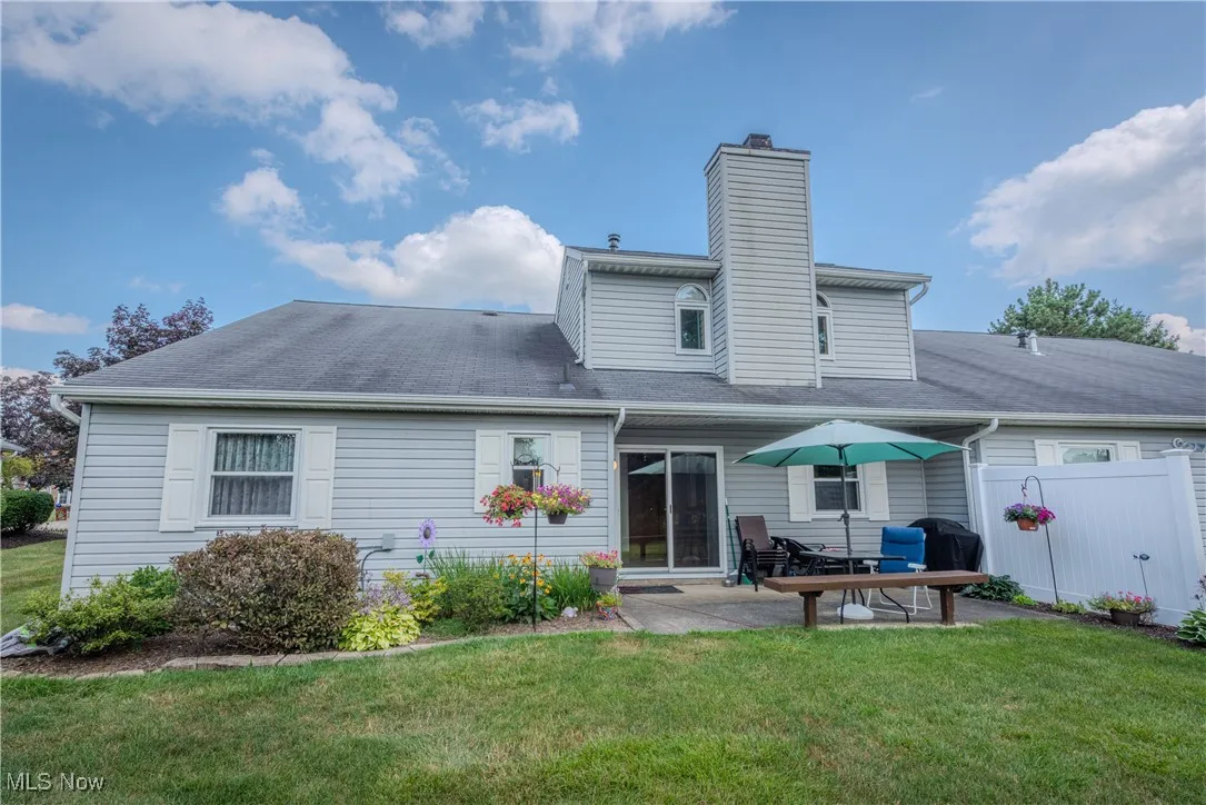Rear view of house featuring a patio