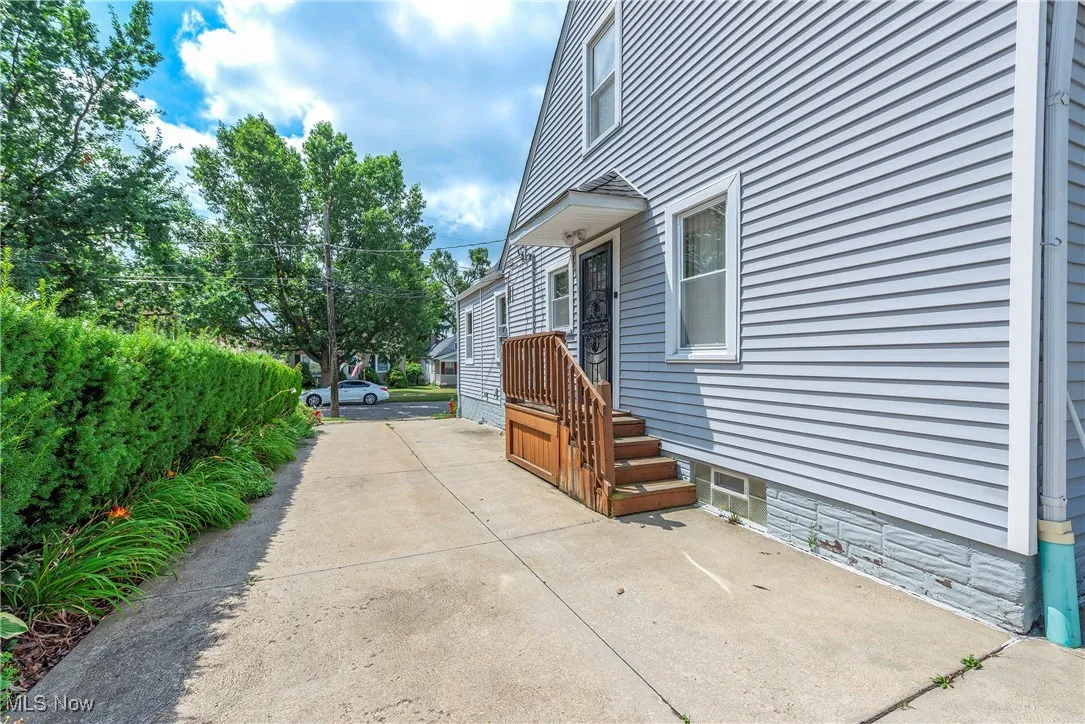 View of patio / terrace featuring concrete driveway