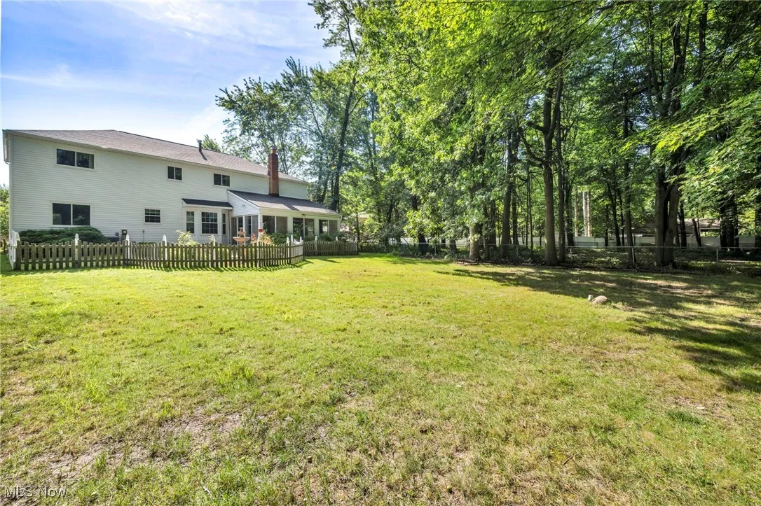 View of fenced backyard