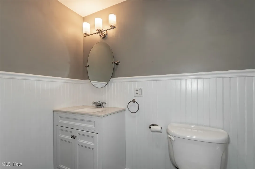 Bath with vanity and wainscoting