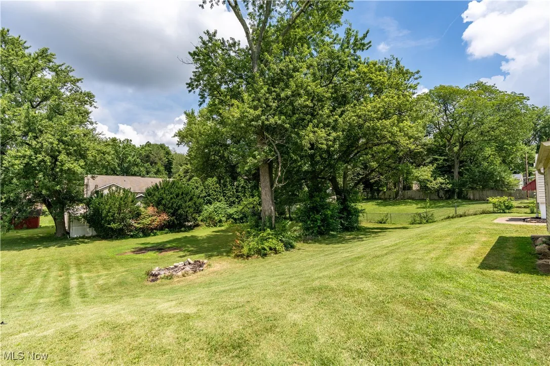 View of yard featuring view of scattered trees