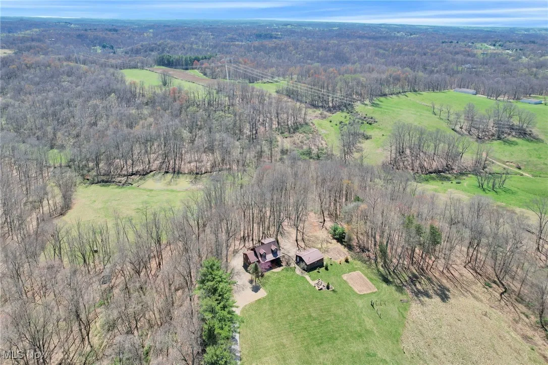 Overview of rural landscape with a heavily wooded area