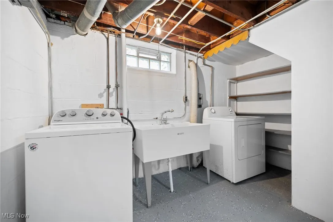 Laundry area featuring separate washer and dryer