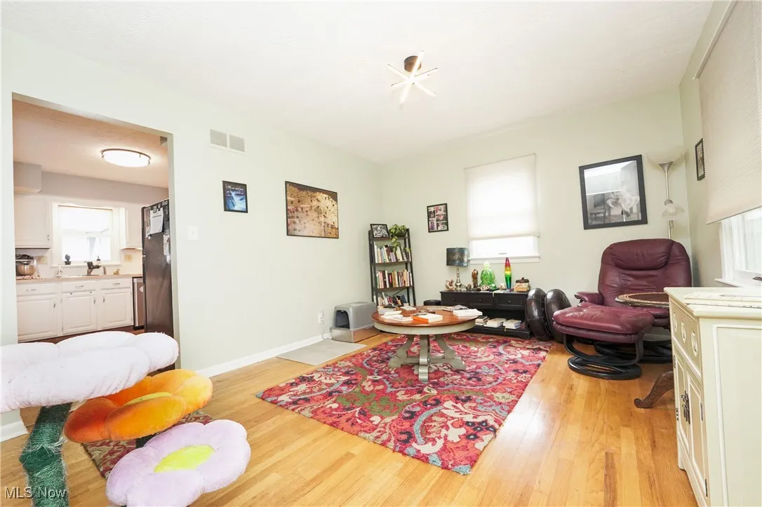 Living area featuring light wood-type flooring