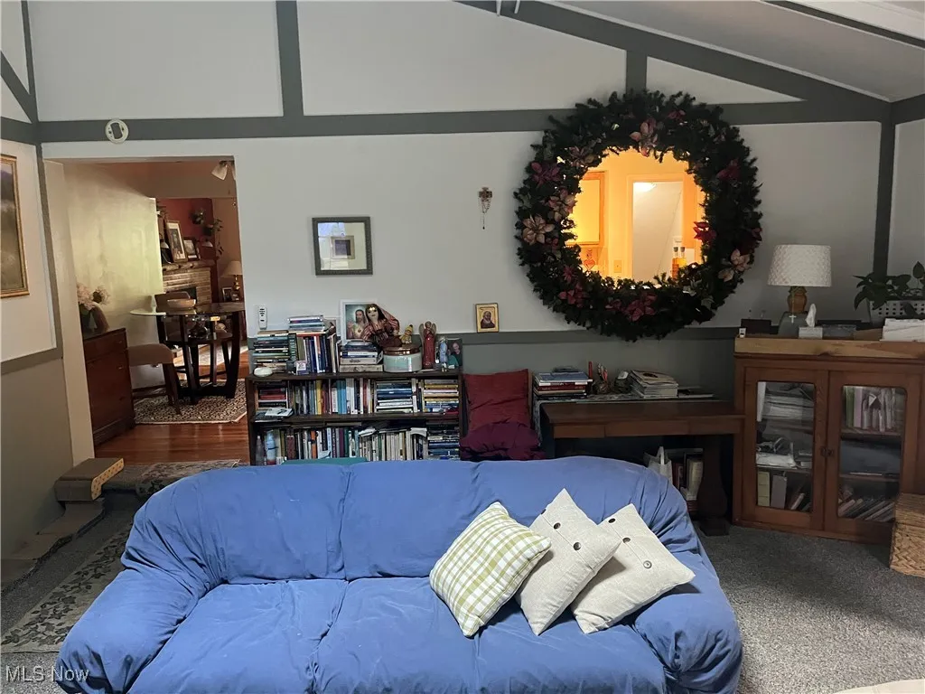 Living area with lofted ceiling