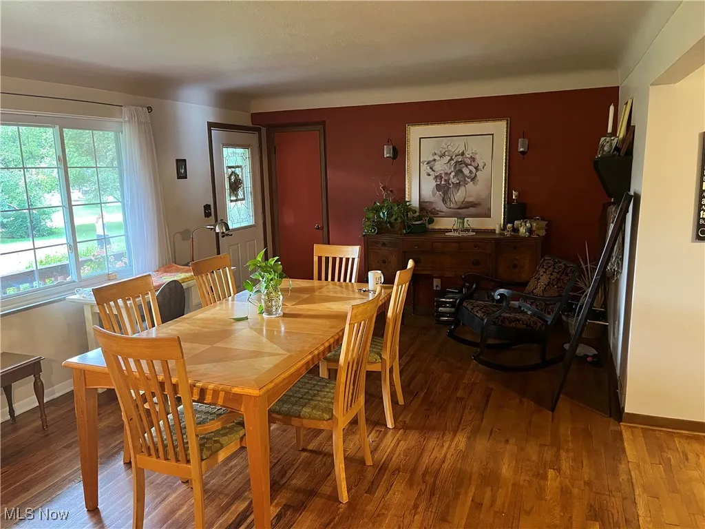 Dining area with wood finished floors