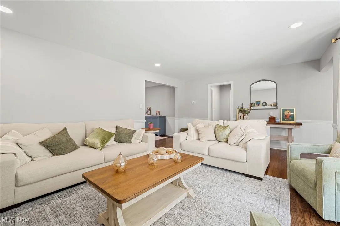 Living area featuring recessed lighting and wood finished floors