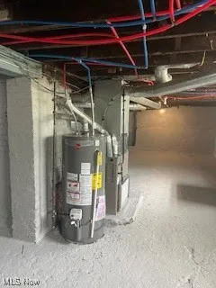Utility room with water heater and heating unit