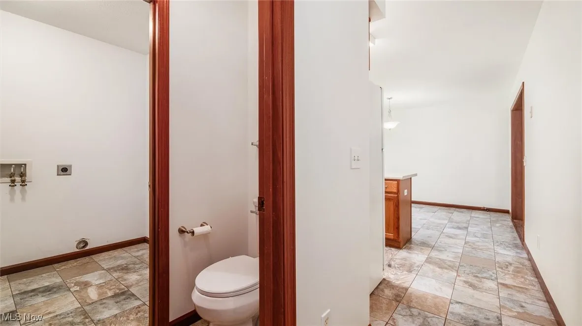 Bathroom with stone finish flooring and vanity