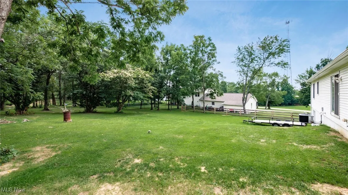 View of yard with view of scattered trees