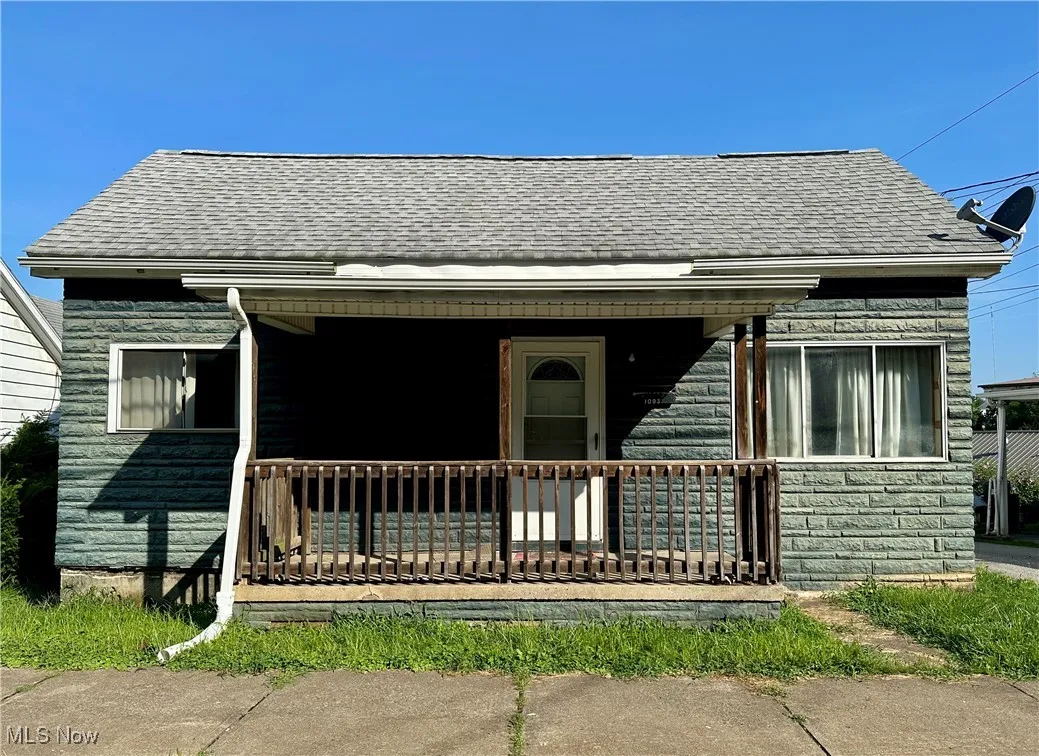 Front view of home featuring a porch