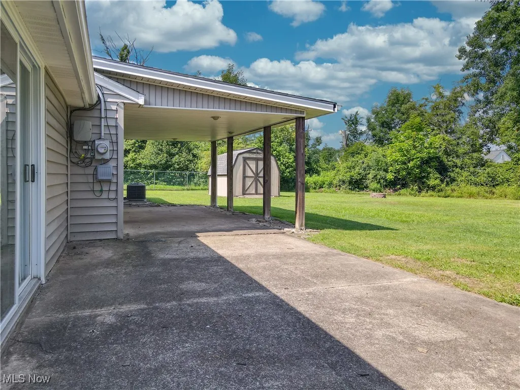 CONCRETE PATIO & COVERED PORCH.