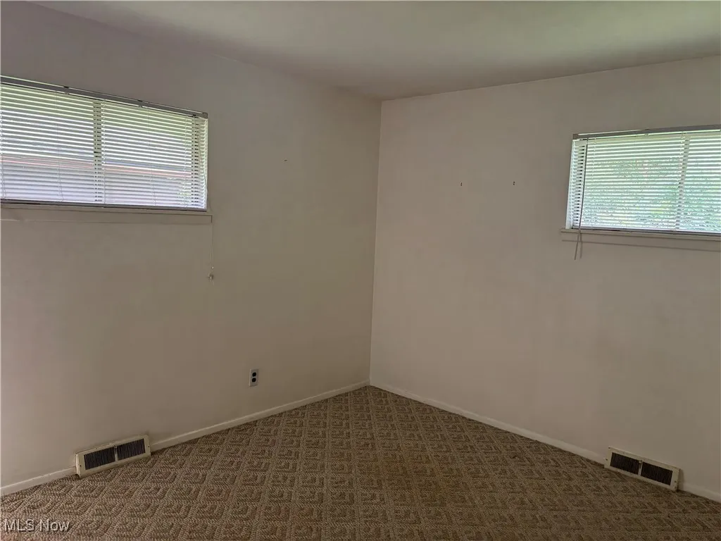 Bedroom room with healthy amount of natural light