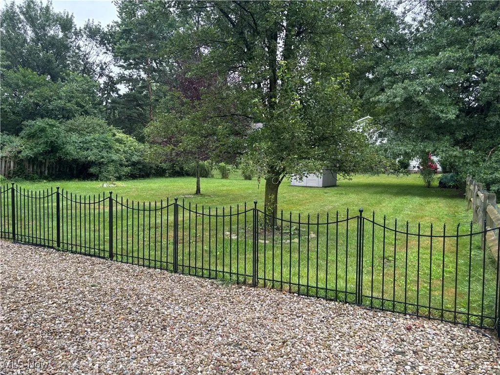 View of yard with an outbuilding