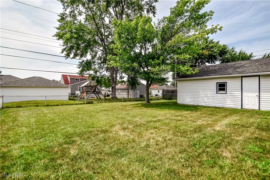 View of fenced backyard