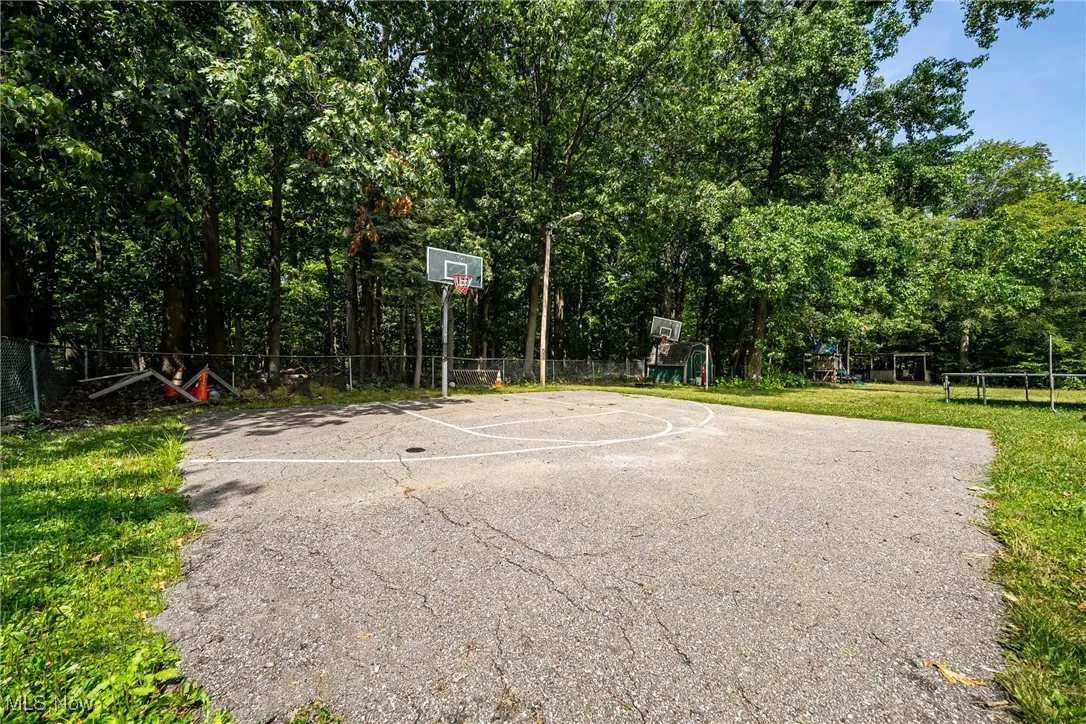 View of basketball court featuring community basketball court