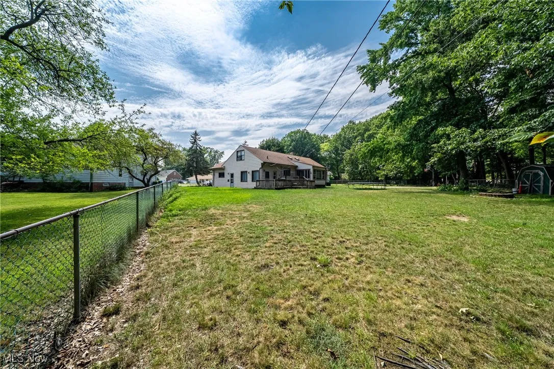 View of fenced backyard