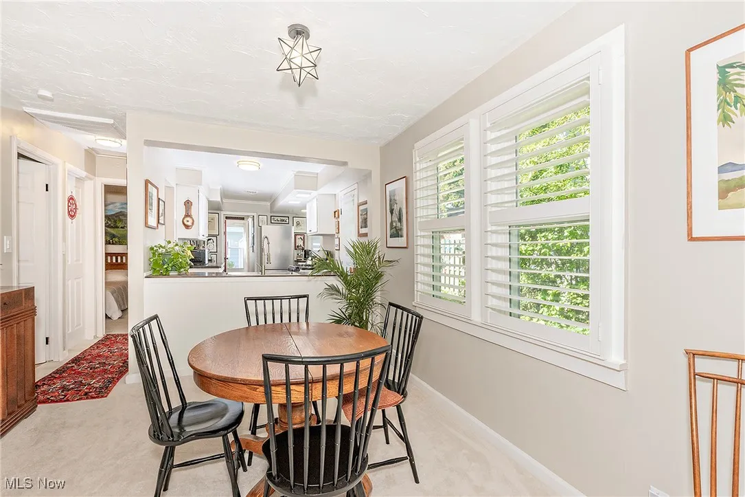The Dining Area is light and bright and wonderfully positioned between the Living Room and renovated kitchen.