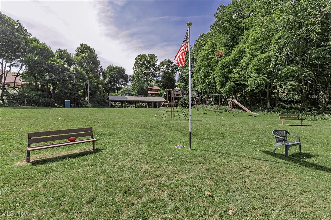 The open space in the optional Gilchrist community includes plentiful green space and a playground.