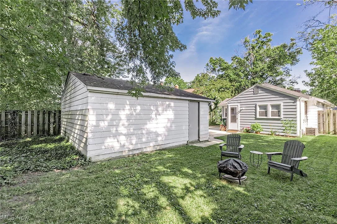 Another view of the backyard (Since the time of this photo, the garage has been painted and the single door replaced)