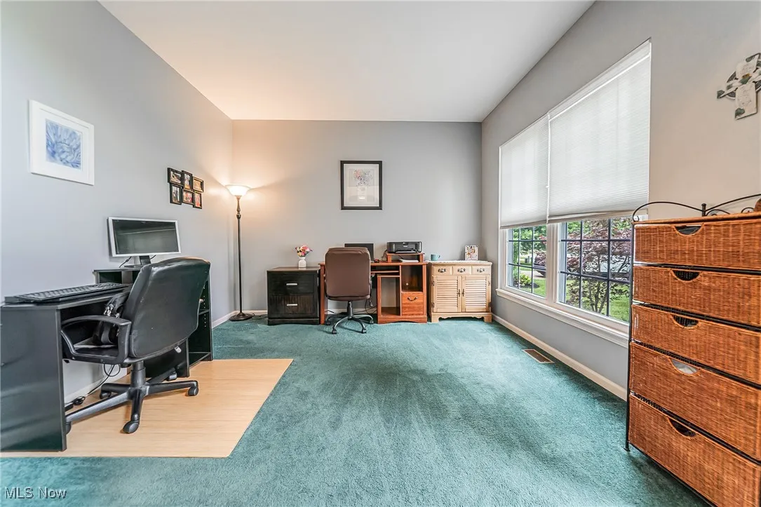Office featuring carpet flooring and baseboards