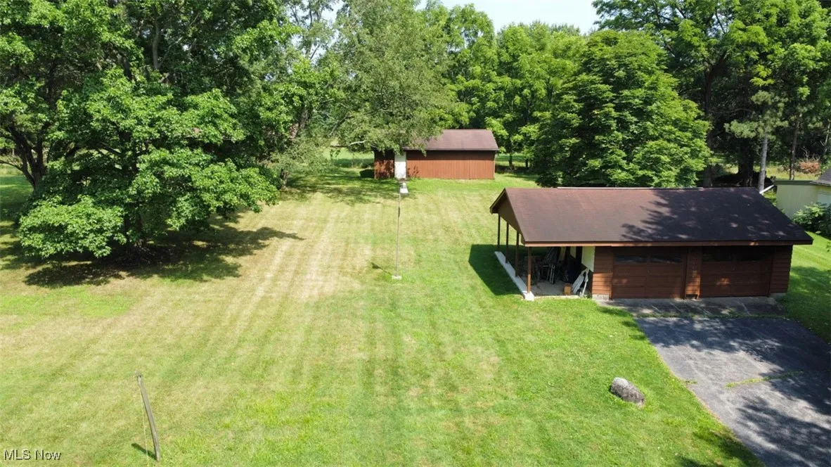 View of outbuildings and yard