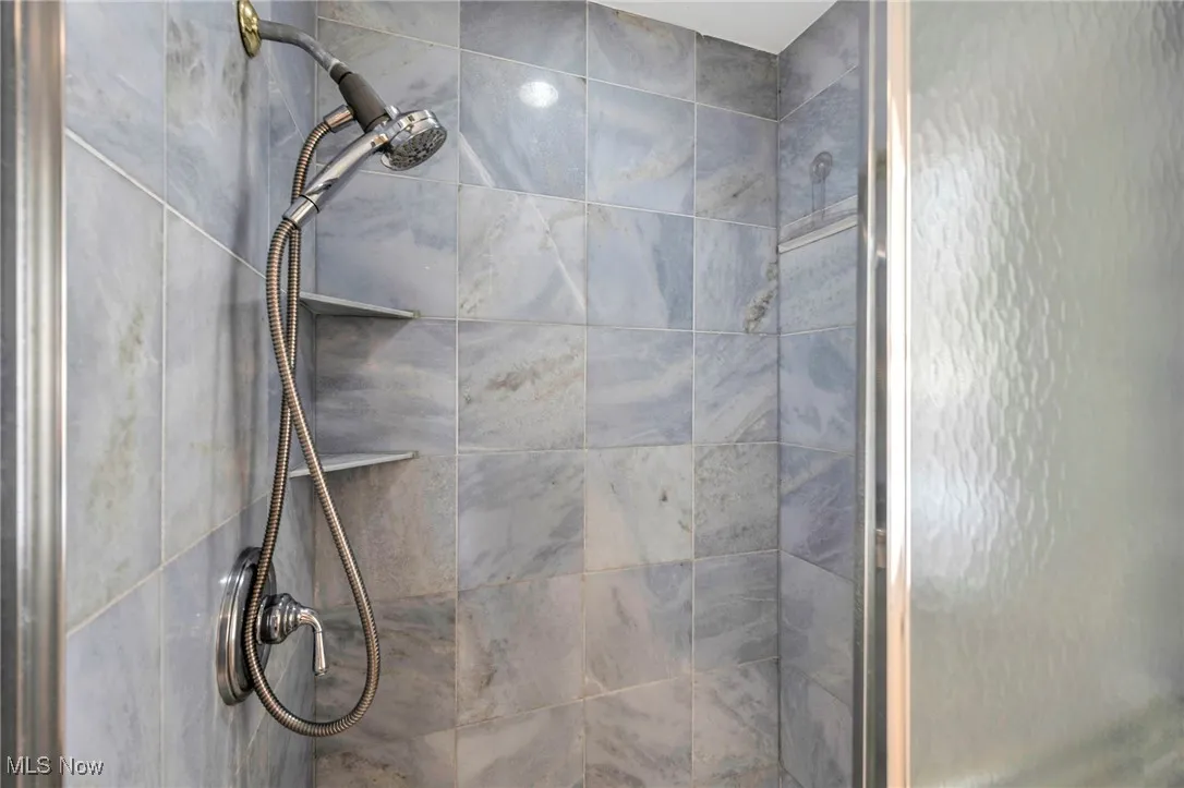 Bathroom view of tiled shower