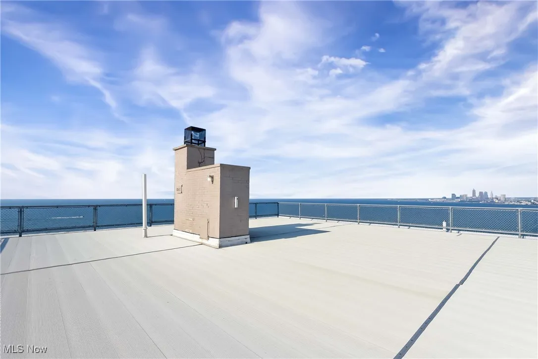 View of patio / terrace featuring a water view