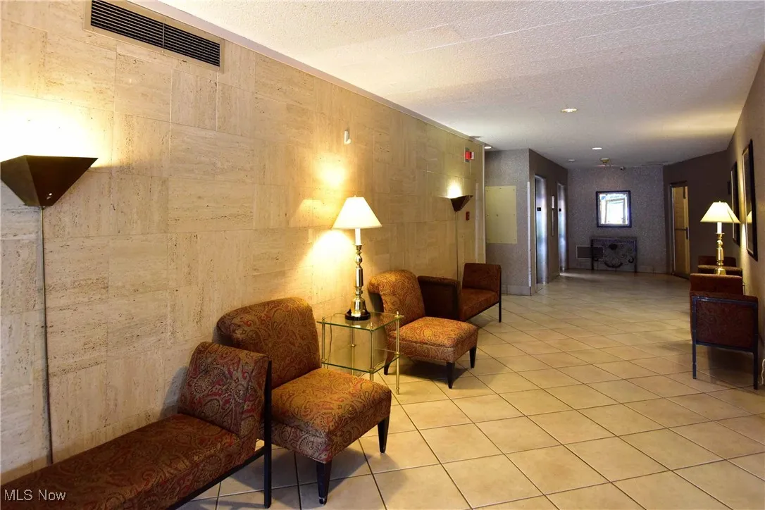 Common area featuring a textured ceiling