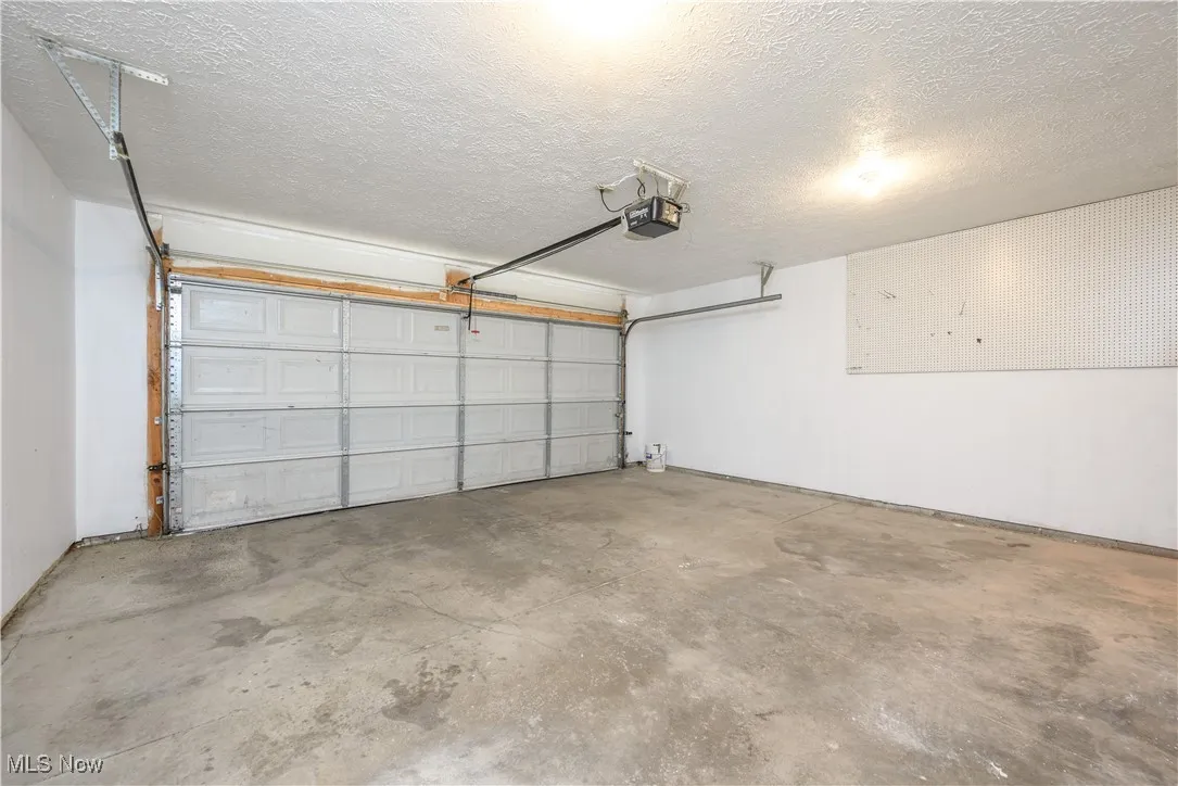 Attached garage with a garage door opener