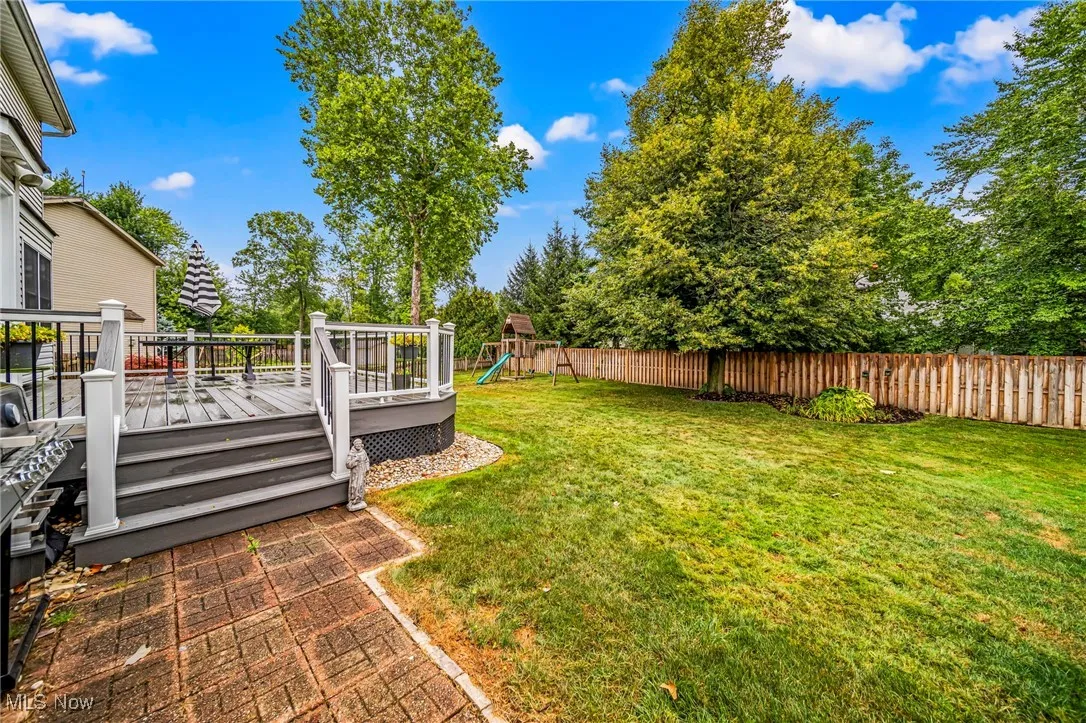 Small brick patio off deck.