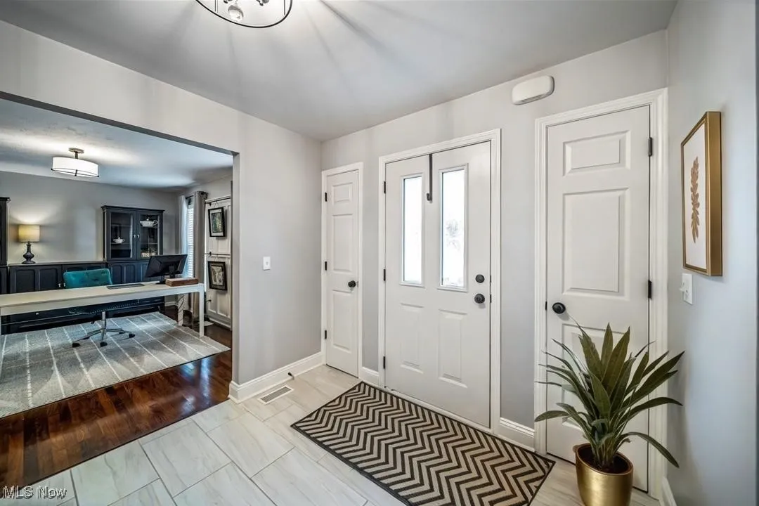 Foyer. Virtually staged.