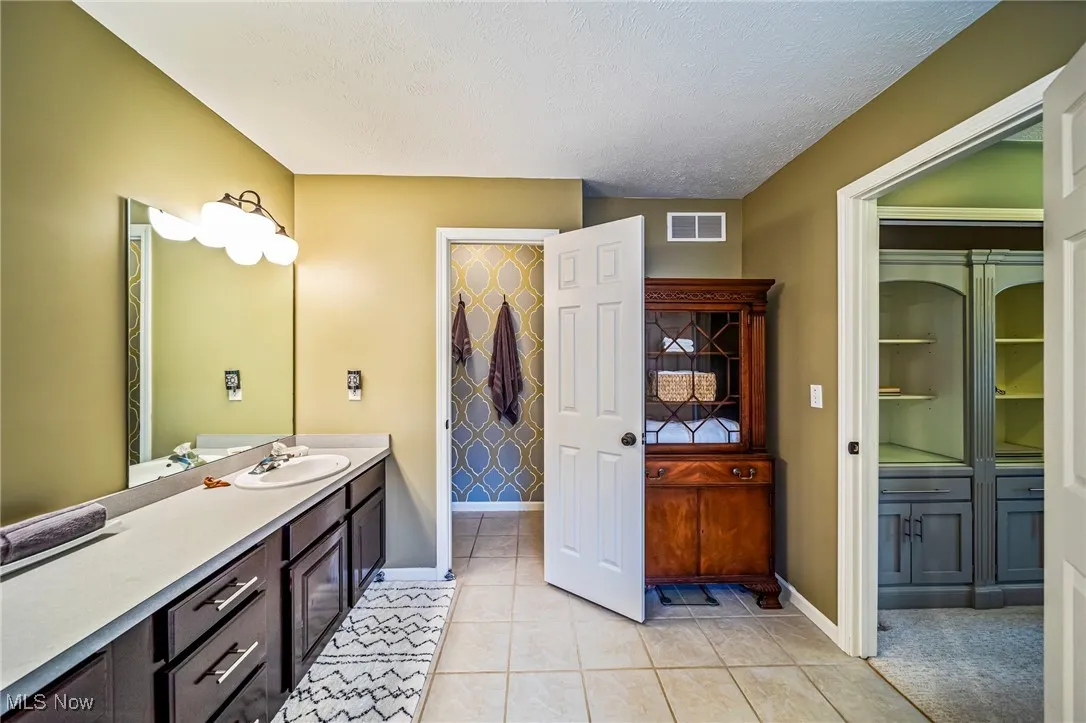 Primary bathroom with separate water closet.