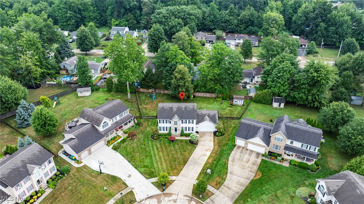 Aerial perspective of home on cul-de-sac.