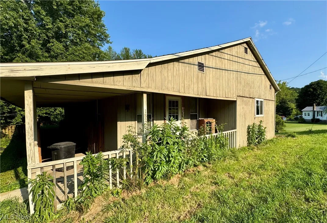 View of front of property with a front lawn