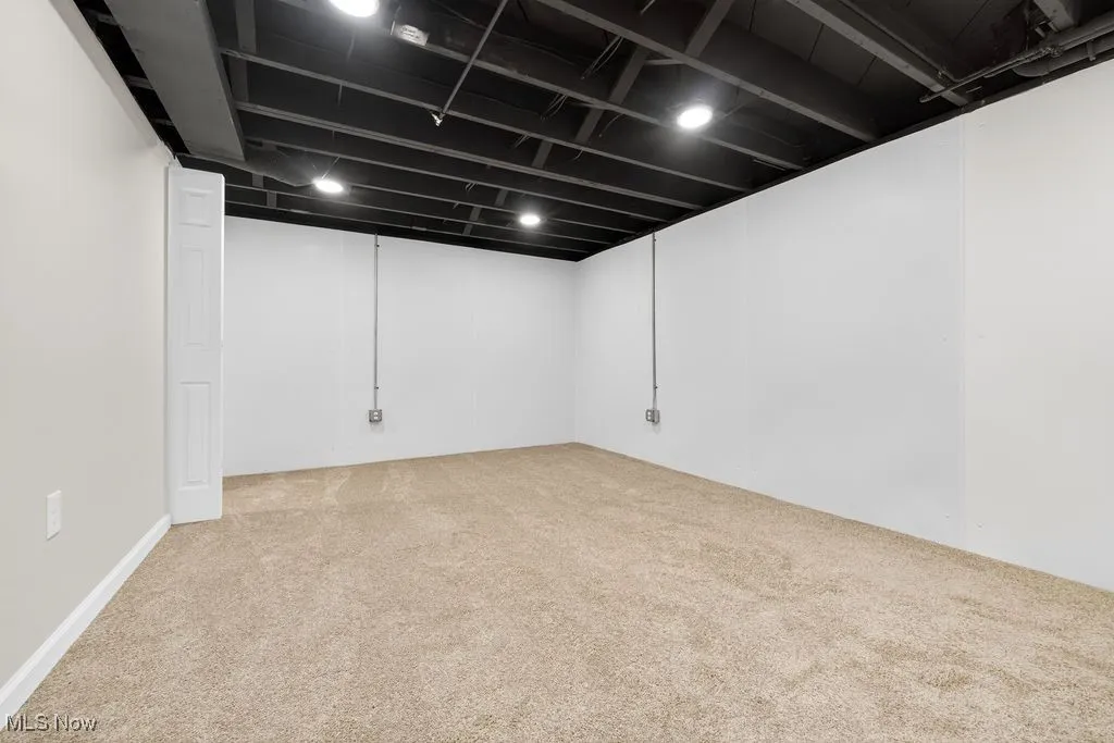 Finished below grade area featuring carpet